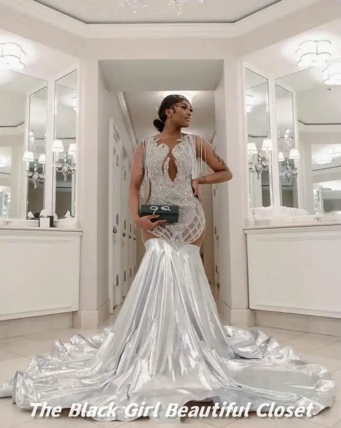 Silver prom dresses with glitter, rhinestones, and fishtail design