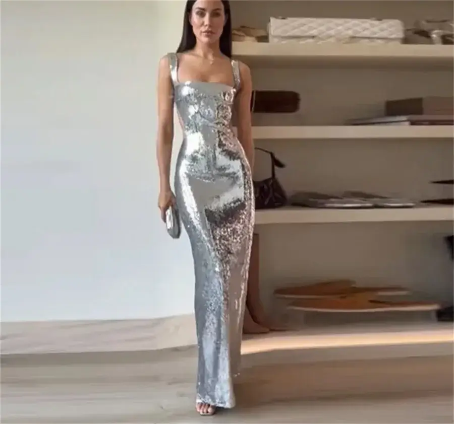Silver prom dresses: Backless, sleeveless mermaid gown with glitter sequins